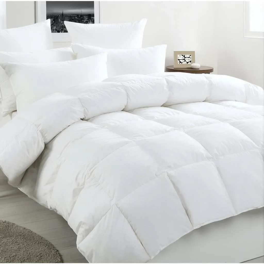 Neatly placed quilt and cover on a bed (secured with Kanga Duvet Clips).